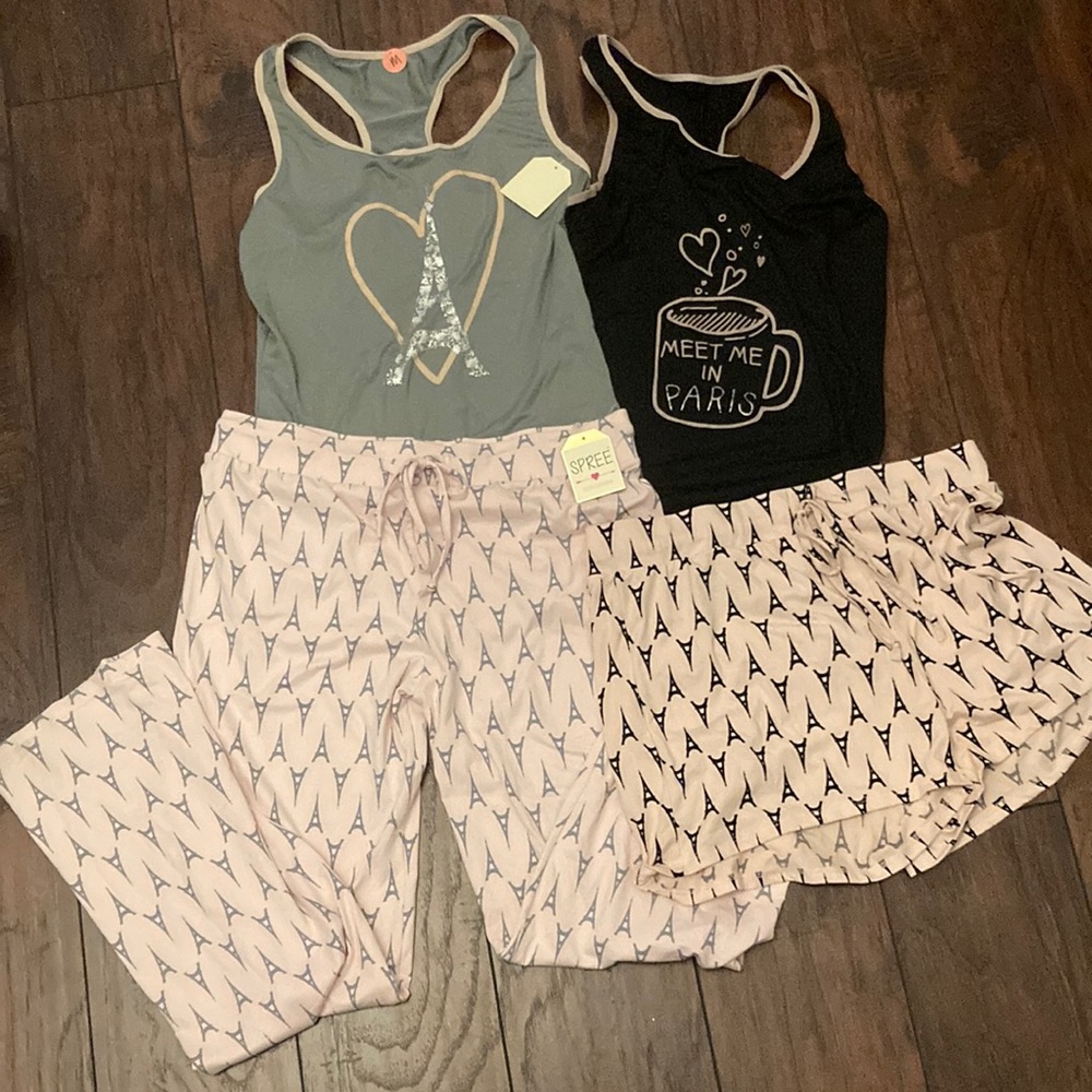 2 two piece paris-themed sleep wear sets.